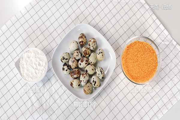 香炸孜然鹌鹑蛋的做法(鹌鹑蛋18个、面粉适量、面包糠)
