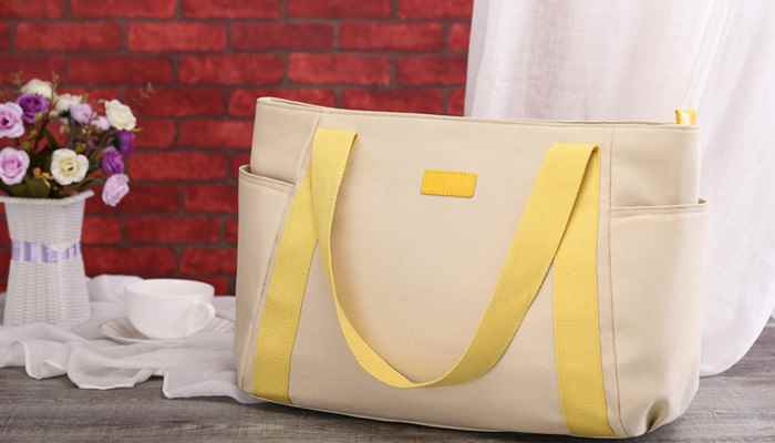 托特包是什么包(托特包是指一种大型手提袋或者购物袋样式的包包样式)