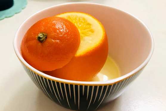 冬天橙子怎么热着吃(冬天吃橙子对身体有什么好处)